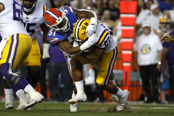 Florida Gators linebacker Ventrell Miller (51) tackles LSU Tigers running back Josh Williams (27). Mandatory Credit: Kim Klement-USA TODAY Sports